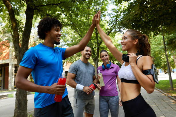 couple giving each other high five after hard training